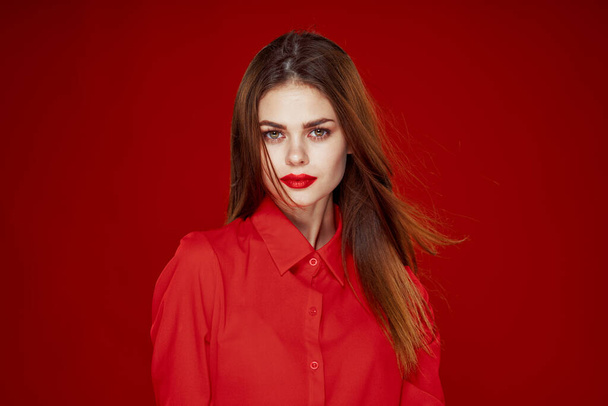 woman in red shirt posing fashion red lips fun - Valokuva, kuva