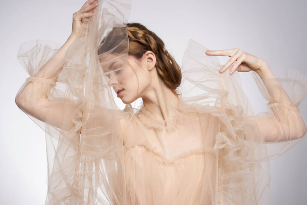 beautiful woman gesture hands cosmetics fashion hairstyle posing model studio - Фото, изображение
