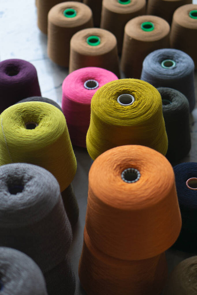 Many multi-colored bobbins of yarn. Knitting. - Zdjęcie, obraz
