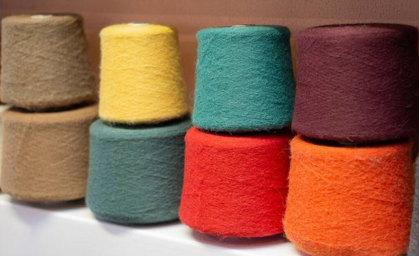Many multi-colored bobbins of yarn. Knitting. - Photo, image