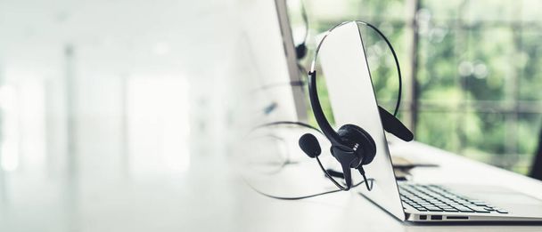 Headset and customer support equipment at call center ready for actively service - Φωτογραφία, εικόνα