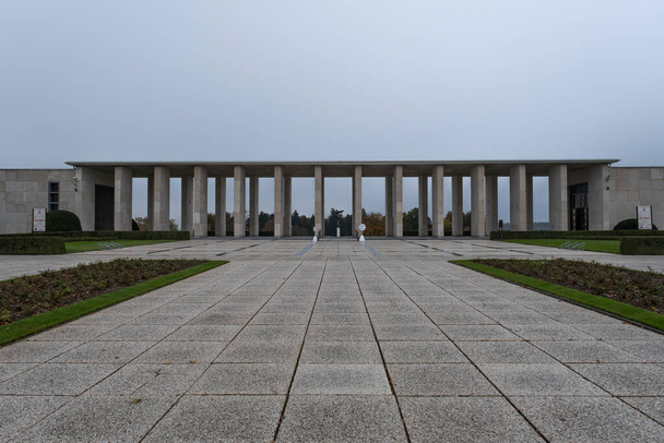 PLOMBIERES, BELGIUM - Nov 14, 2021: Henri-Chapelle American Cemetery and Memorial. Many of the burial are from  Ardennes winter offensive (Battle of the Bulge). Autumn rainy day. - Fotó, kép