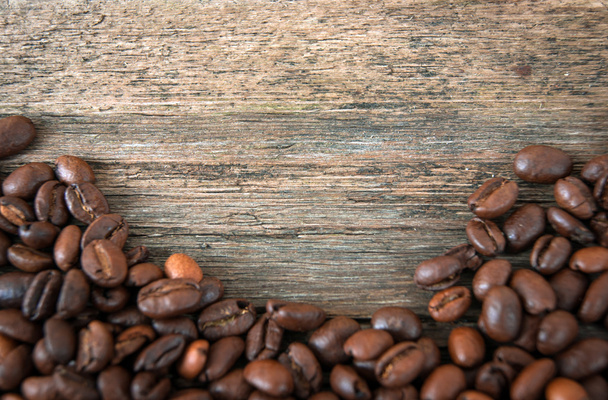 Coffee beans on wood background - Фото, зображення