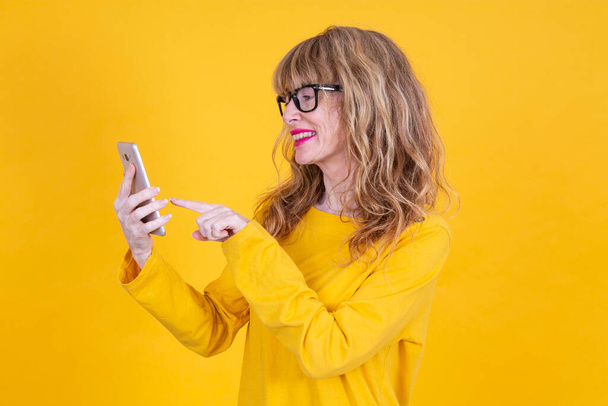 adult woman with mobile phone isolated - Photo, image