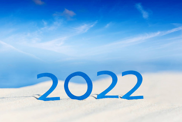Sunny tropical beach and 2022 happy new year. Season vacation and holiday concept - Zdjęcie, obraz