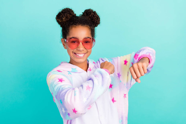 Photo of young cheerful afro girl have fun dancer sleepover eyewear isolated over turquoise color background - Fotografie, Obrázek