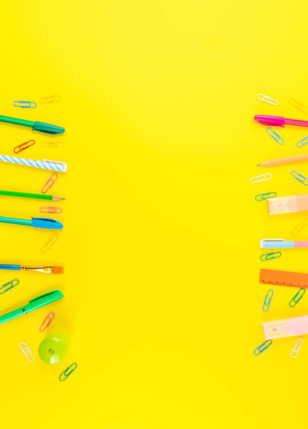 Back to school concept. Colorful office stationery on yellow background - Photo, Image