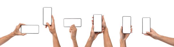 Manos masculinas sosteniendo smartphone con pantalla en blanco en diferente orientación - Foto, imagen