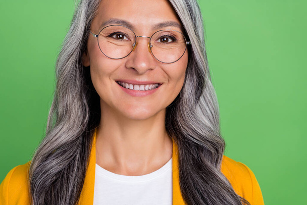 Cropped photo of senior cheerful lady eyewear cavity protection clinic isolated over green color background - Φωτογραφία, εικόνα