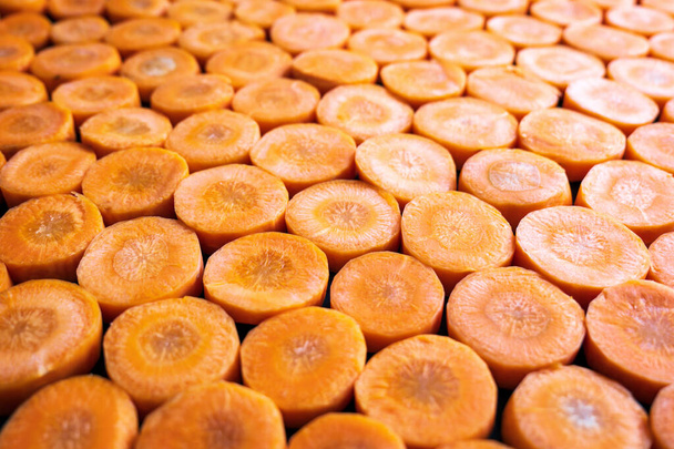 Fresh carrot slices closeup background - Foto, imagen