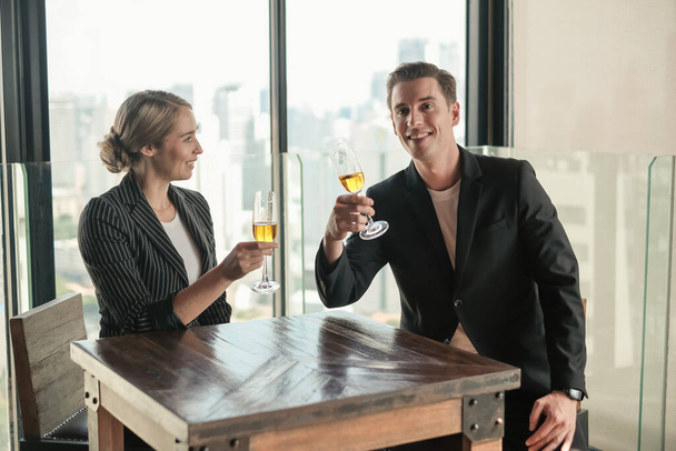 Two businessman and businesswoman couple meeting in co working space at sky lounge or office - Foto, imagen