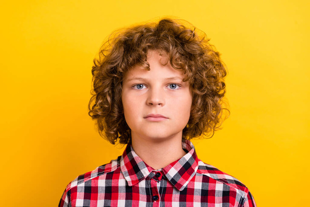 Photo of strict ginger hairdo small boy wear red plaid shirt isolated on yellow color background - Photo, image