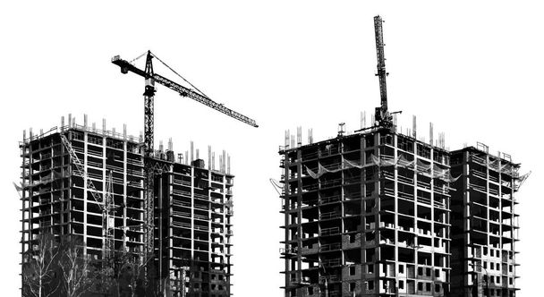 Construction of two monolithic multi-storey buildings isolated on a white background. Construction tower cranes rise above the houses. Monochrome vector illustration. - Vector, Image