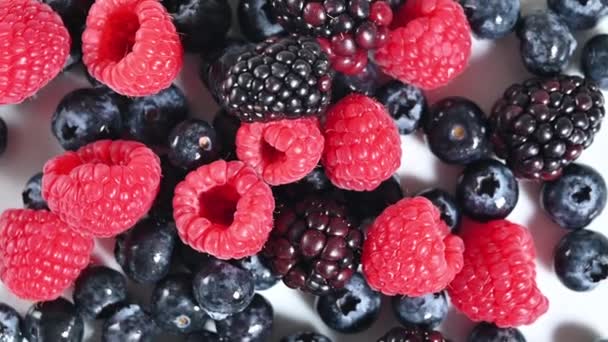 Fresh berries rotating, top view, 4K - Footage, Video