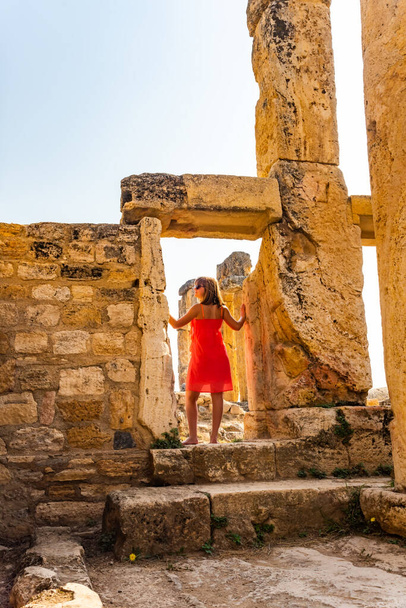Girl in Hierapolis ancient city ruins Pamukkale Turkey UNESCO world heritage - Foto, Imagen