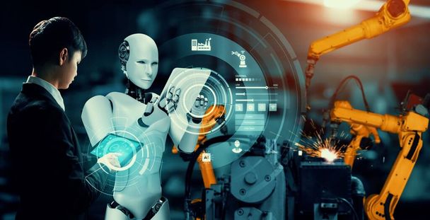 Robot industrial mecanizado y trabajador humano trabajando juntos en la futura fábrica - Foto, Imagen