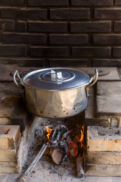 Wood stove with aluminum pan. - Photo, Image