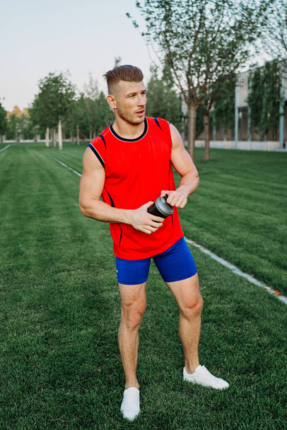 athletic man in park crossfit lifestyle workout - Fotó, kép