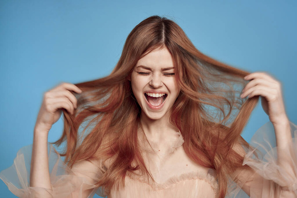 portrait of a woman hairstyle fun posing cosmetics fashion isolated background - Zdjęcie, obraz