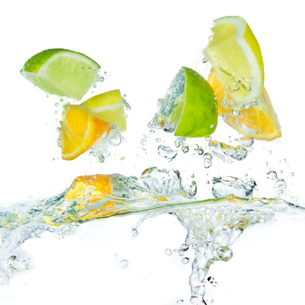 Citrus fruit splashing - Photo, Image