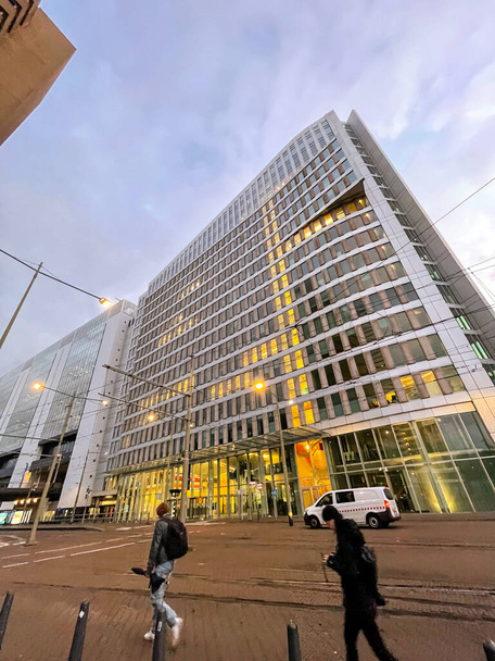 The Hague, Netherlands - October 7, 2021: View from the broad streets of the business district of The Hague in a warm fall evening. - Foto, immagini