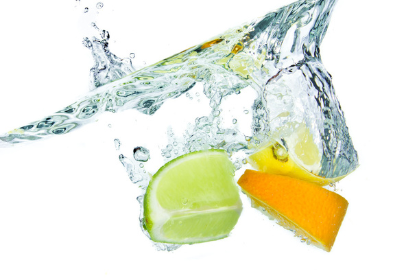 Citrus fruit splashing - Foto, afbeelding