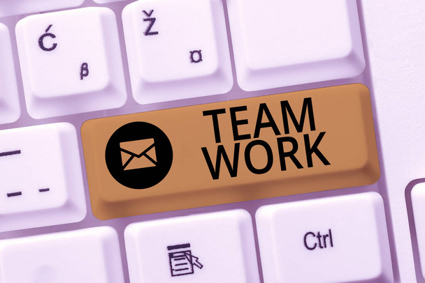 Text sign showing Team Work. Word for Combined action of a group Workgroup cooperation collaboration Writing Interesting Online Topics, Typing Office Annoucement Messages - Photo, Image