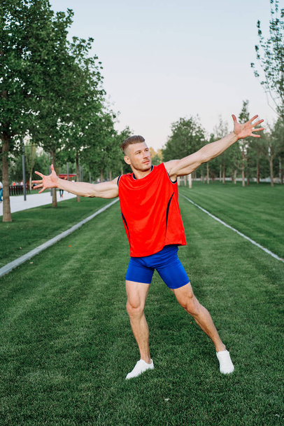 athletic man in park crossfit lifestyle workout - Fotó, kép