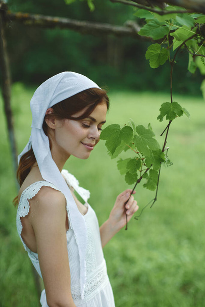cheerful woman outdoors in the garden countryside ecology nature - Foto, Bild