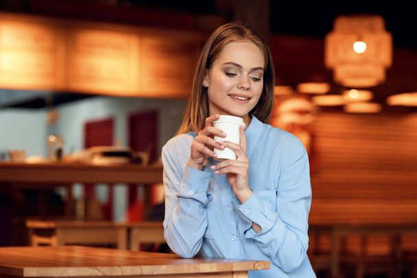 Business woman in a cafe outdoors fresh air summer - Fotoğraf, Görsel