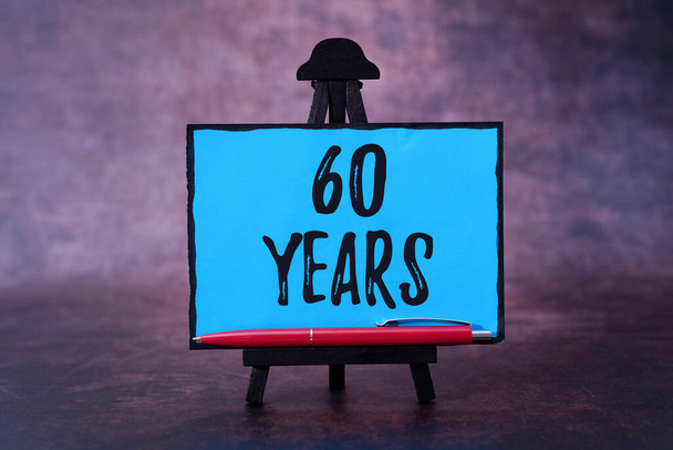 Text sign showing 60 Years. Word Written on It is the onset of a golden era Commemorating a special day Thinking New Bright Ideas Renewing Creativity And Inspiration - Photo, Image
