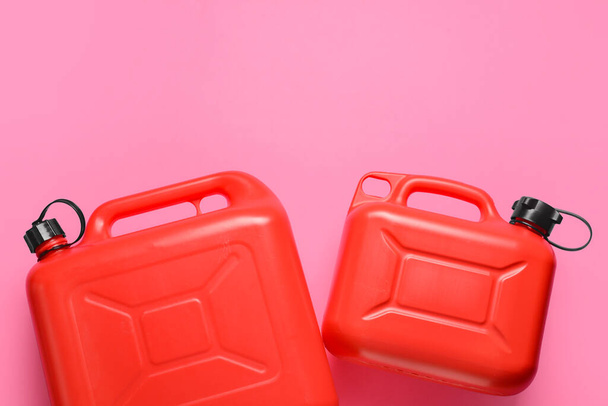 Plastic jerrycans on color background - Photo, Image