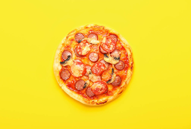 Delicious mini pizza on yellow background - Photo, Image