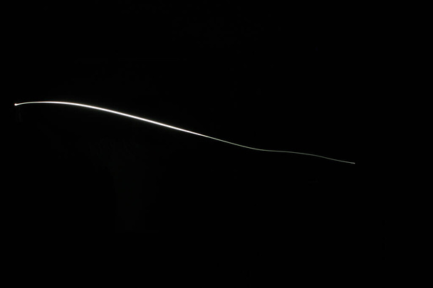 An illustration of bright light on a black background - Foto, Imagen
