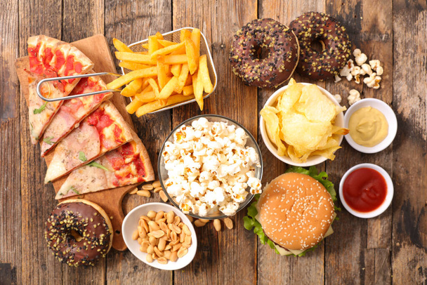 assorted of junk food- unhealthy product - top view - Foto, imagen