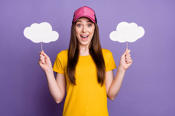 Photo of cheerful amazed happy woman hold hands stick cloud forecast isolated on violet color background - Foto, imagen