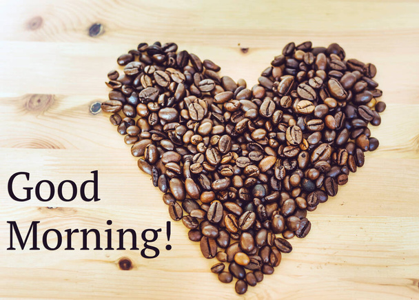Heart from coffee beans with good morning text - Φωτογραφία, εικόνα