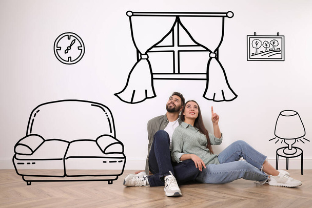 Happy couple dreaming about renovation on floor. Illustrated interior design - Foto, imagen