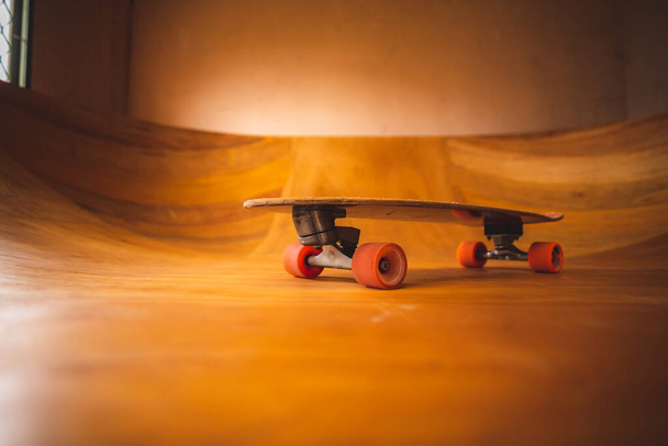 skateboard indoor at beautiful summer day. Sport activity lifestyle concept - Foto, Bild