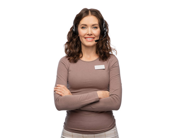 female helpline operator with headset and name tag - Fotó, kép