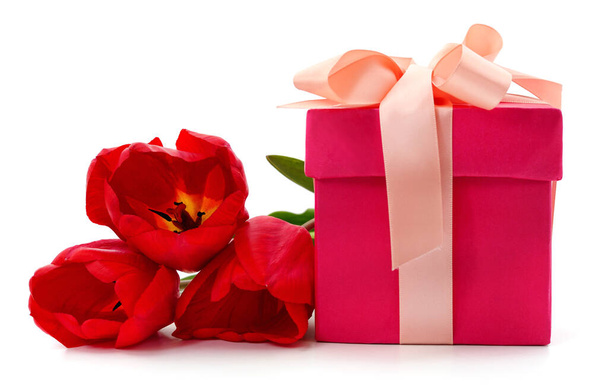 Red tulips and gift isolated on a white background. - Foto, immagini
