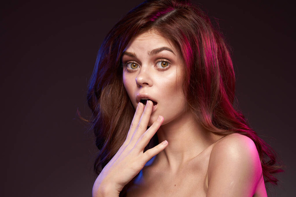 sexy woman makeup posing naked shoulders hairstyle dark background - Foto, Imagem
