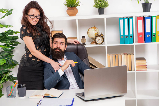 Flirting with special one. Woman touching man colleague. Flirting at office. Workplace flirt - Fotó, kép