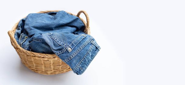 Blue jeans in laundry basket - Photo, Image