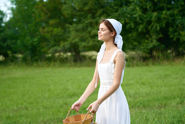 cheerful woman outdoors in the garden countryside ecology nature - 写真・画像