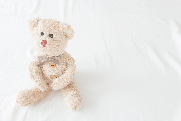 A happy teddy bear is smiling. - Фото, изображение