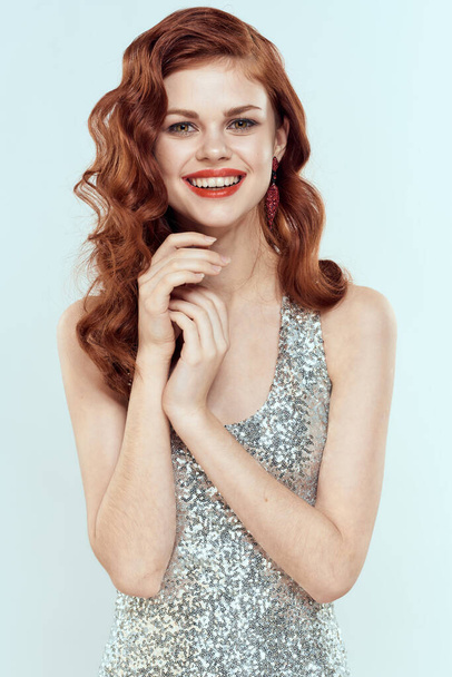 attractive woman redhead posing cosmetics glamor blue background - Fotó, kép