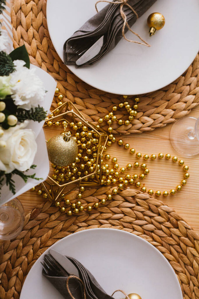 new year christmas table decor in gold tones top view close up - Photo, Image