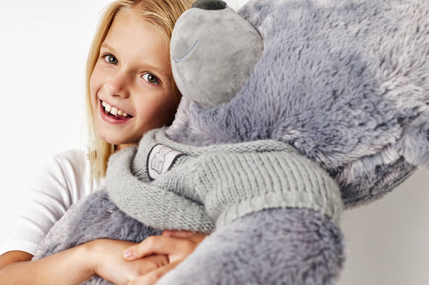 happy cute girl with teddy bear a toy kids lifestyle concept - Zdjęcie, obraz