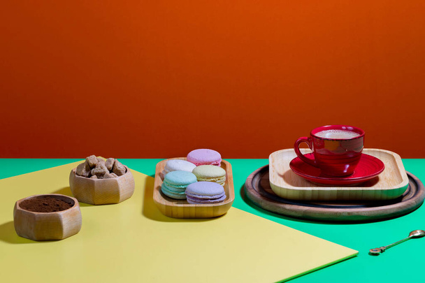 Coffee with dessert on a bright colored background - Photo, Image